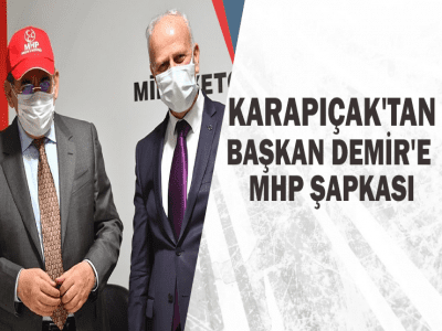 BAŞKAN DEMİR'E MHP ŞAPKASI