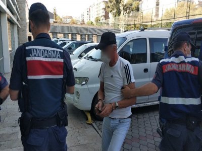 Toprağa gömülen bonzaiyi çıkartırken yakalandılar